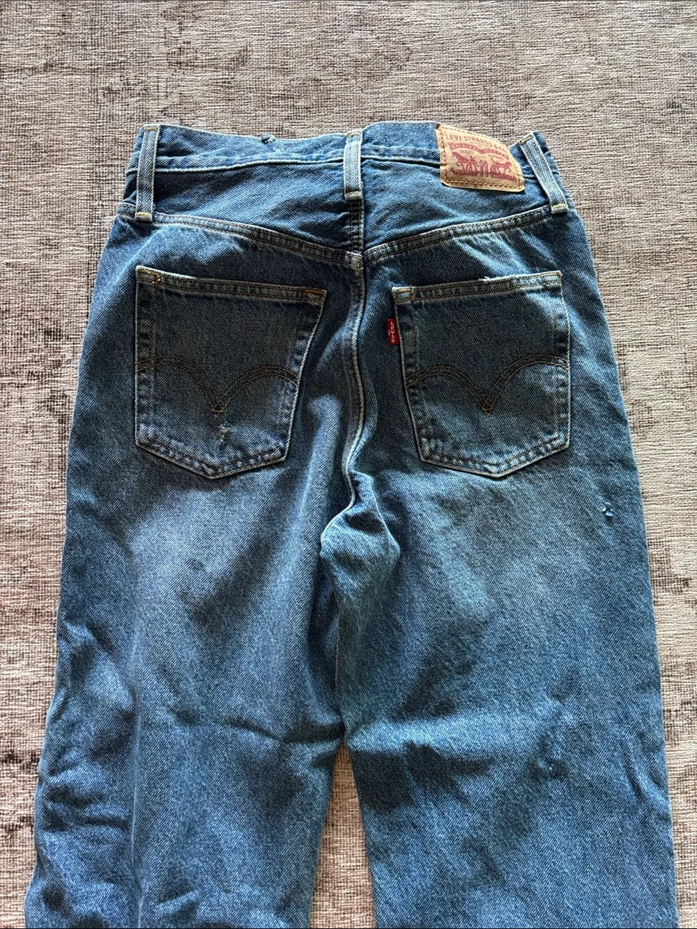 Levi rib cage straight ankle size 26 reworked knee patch detail
